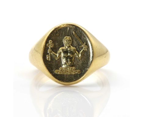 An 18ct gold oval Signet ring,intaglio engraved with the crest of Murray Duke of Athol. Head 16.50mm x 13.00mm, 15.74g.Finger