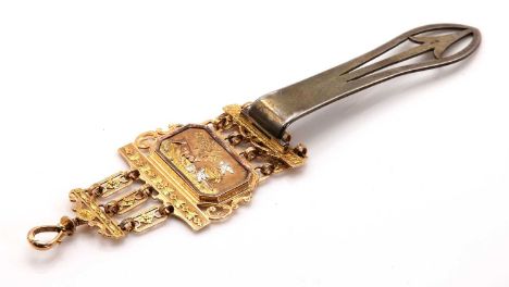 A French four colour gold Chatelaine, c.1780,with a silver belt clip. A scroll top bar with an applied leaf and flower head g