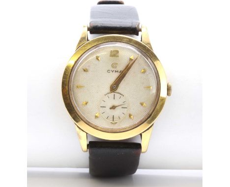 A gentlemen's 18ct gold Cyma mechanical strap watch, with a 33mm case, a silvered waffle textured dial with raised kite and p