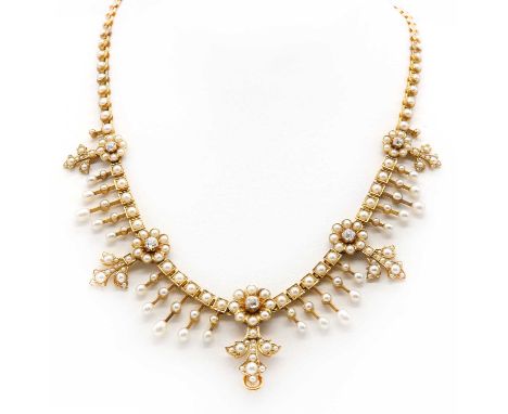 A late Victorian diamond, pearl and split pearl fringe necklace,with a central fleur de lis concealing a spinel hinged pendan