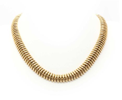 An Italian two row gold curb link choker necklace, with decorative arched bars to the front of the links, with a concealed bo