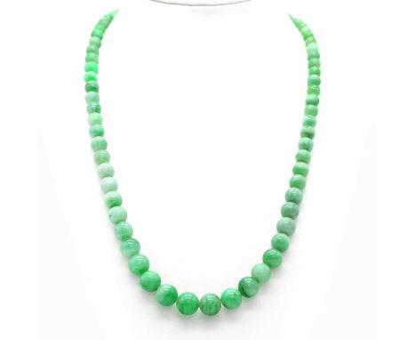 A silver row graduated nephrite jade bead necklace,with a diamond set clasp. Seventy two graduated jade beads 3.60mm to 9.50m