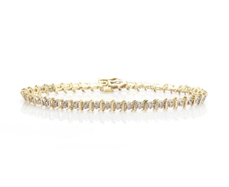 A diamond set line bracelet, each link formed as an 'S' figure beside an illusion set round brilliant cut diamond, fully arti