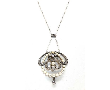 A cased Art Nouveau seed pearl and diamond pendant, by The Goldsmiths &amp; Silversmiths Company Ltd.a graduated whiplash fra