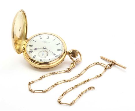 An 18ct gold side wide Hunter pocket watch, by J W Benson,with a 43mm case. A crest and motto hand engraved to the front cove