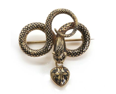 An early Victorian serpent or snake form brooch, c.1840, with a coiled and looped snake holding a pendant heart in its mouth.