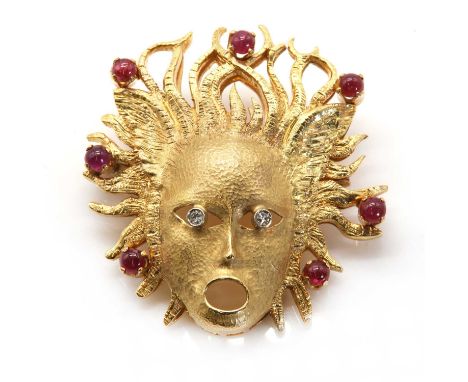 An Italian diamond and ruby Medusa brooch,with an eight cut diamond, rub set in a white collet to each eye. A finely polished