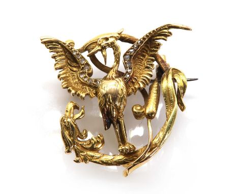 A French diamond set gold chimera brooch, c.1900,with the chimera or dragon staring with mouth open, wings outstretched, grai