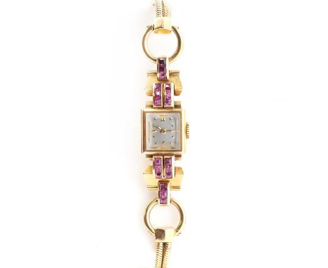 A French gold ruby mechanical cocktail watch,with a rectangular case, 13mm x 17mm, and a square silvered dial, faceted gold d