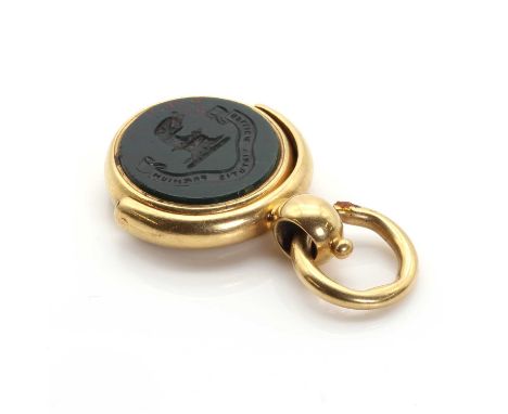 A Victorian hardstone swivel seal,with a bloodstone matrix to both sides. Intaglio engraved to one side with a crest and mott