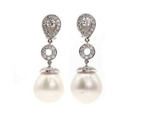 A pair of cultured South Sea pearl and diamond drop earrings,with a briliant cut diamond, estimated as approximately 0.40ct e