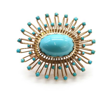 A Continental gold turquoise set sunburst brooch/pendant, c.1960,with an oval cabochon turquoise, claw set to the centre in a