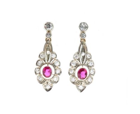 A pair of Belle Epoch synthetic ruby and diamond drop earrings,possibly American. An oval synthetic ruby, milligrain set to a