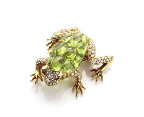 An 18ct gold peridot, ruby and diamond frog brooch, by David Morris,with calibré cut cabochon peridots forming the body. Cabo