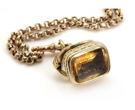 A late Victorian faceted belcher link guard chain,with a 9ct gold swivel clip to one end, holding an early Victorian citrine 