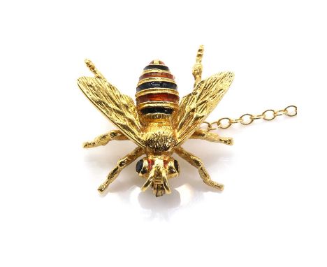 An 18ct gold enamelled bee brooch,with faceted sapphire eyes, and a red and black striped enamel abdomen, with textured wings