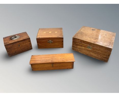A George III oak cash box, a writing box, a mahogany box and a box of ebony dominoes 
