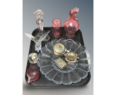 A group of brass and cloisonne enameled items, cranberry glass items, candlestick, crystal figure of a duck in flight.