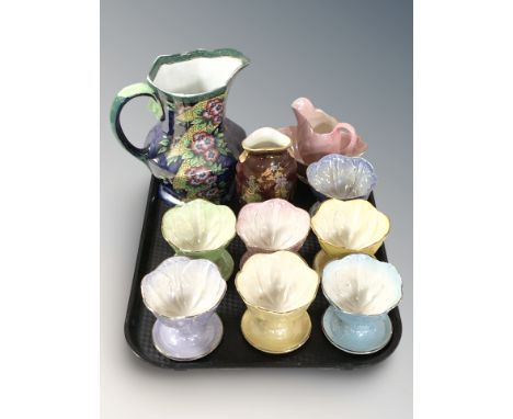 Seven Maling lustre grapefruit dishes, a further jug, a small pink bowl and matching jug and a Crown Devon lustre vase.