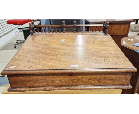 Late 19th century mahogany table-top bureau with lid enclosing drawers and pigeonholes, with plaque inscribed 'Presented to M