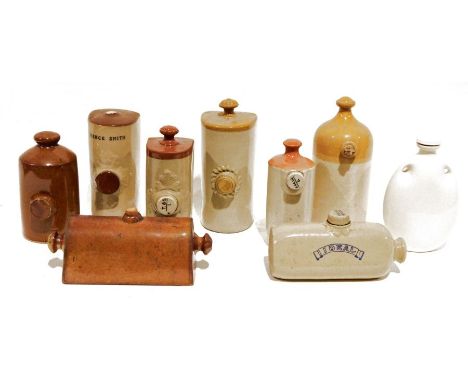 Quantity of stoneware hot water bottles&nbsp;to include examples by Mence Smith, Grimwades, J. R. Price Bristol, West Brother