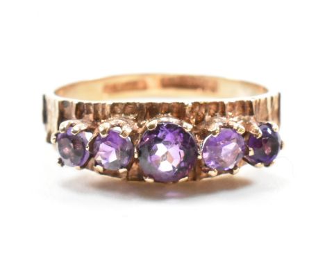 A 1970s hallmarked 9ct gold amethyst five stone ring. Hallmarked Birmingham 1971.Weight 2.3g. Size N.5. All weights, measurem