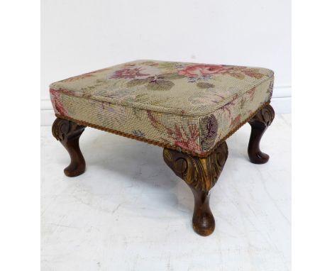 A small stool with floral tapestry top and short cabriole legs carved at the knees with acanthus (41.5cm wide x 23.5cm high)