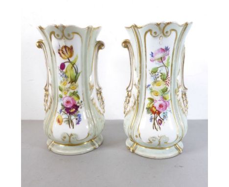 A pair of mid-19th century ceramic vases hand gilded and decorated with floral sprays in enamels (minor damage)