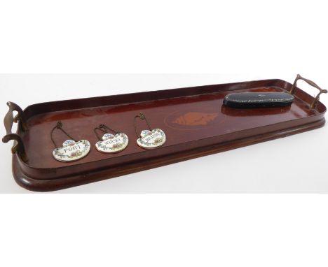 An elongated mahogany two-handled serving tray decorated centrally with a marquetry conch shell. Together with a mid-19th cen