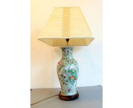 A baluster-shaped Portland vase hand-decorated in the Orientalist style as a lamp and with pleated shade (67cm high)