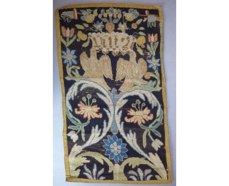 A needlework tapestry&nbsp;in 17th / 18th century style;&nbsp;two doves perched upon scrolling leaves and tendrils terminatin