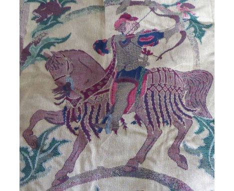 A pair of curtains in a heavy, lined, tapestry-style fabric decorated with medieval-style hunting scenes of riders with falco