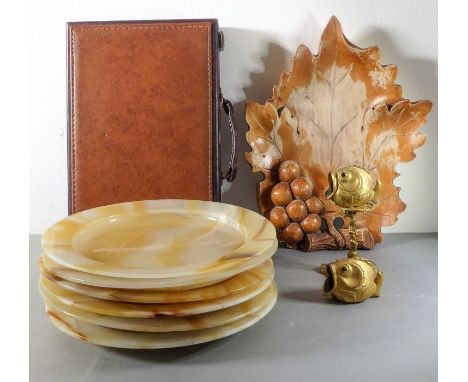 An assortment of items to include six heavy 30cm onyx dining plates, a wooden carving of a maple leaf, a folding backgammon b