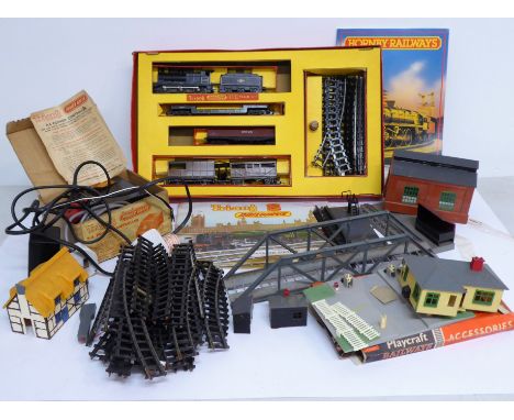 A Tri-ang 00 gauge boxed electric model railway set complete with two Tri-ang Railways booklets and various track, bridge and