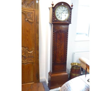 An early 19th century mahogany-cased eight-day longcase clock: the twelve-inch white enamel dial with Roman numerals and subs