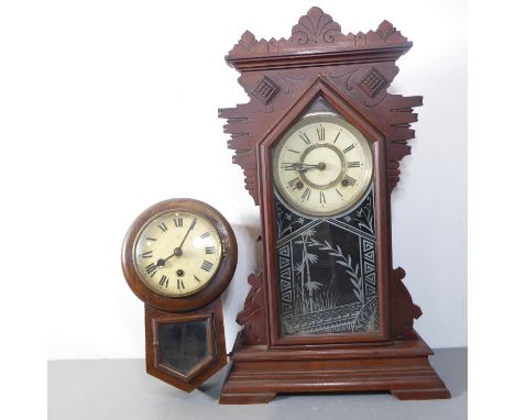 A late 19th century Ansonia Clock Company (New York, USA), stained-wood eight-day mantle clock, the carved 'tramp art' style 