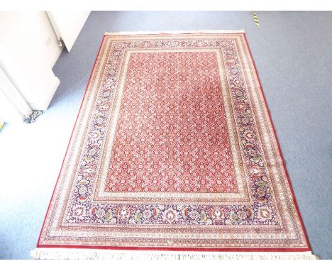 A large red ground Kurdistani Diamant carpet (100% pure New Zealand wool pile, extremely dense weave) (250cm x 350cm)