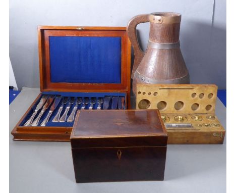 An early 20th century fitted mahogany cased set of twelve silver plated fish eaters, together with George III period mahogany