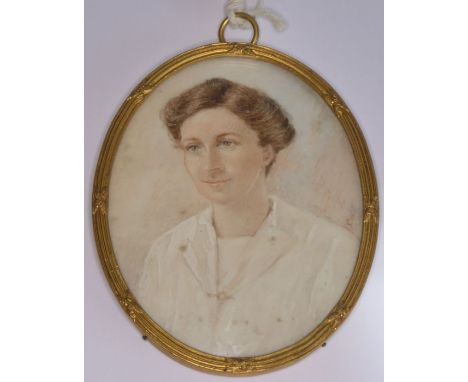 An early / mid-20th century shoulder-length female portrait study; the subject with combed brown hair and white tunic, signed