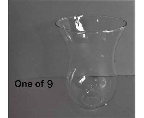 A box of nine thistle-shaped clear-glass lamp shades (original shipping box)