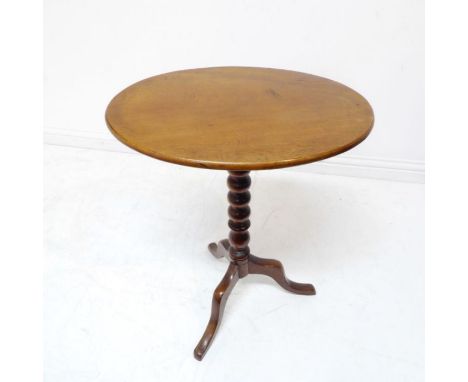 A 19th century oval-topped mahogany occasional table; bobbin-turned stem and on tripod base with strengthening 'spider' to un