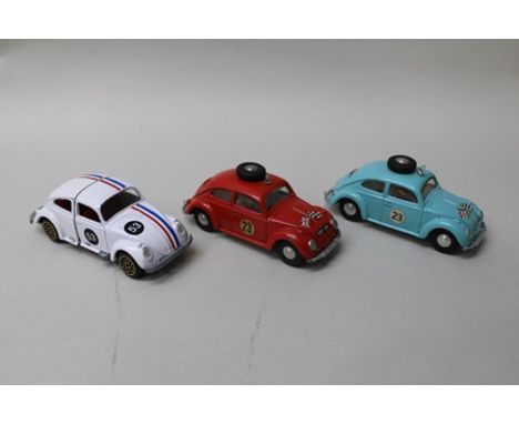 SPOT ON MODELS BY TRIANG 1:42 scale die-cast vehicles, two VW, one in red rally livery, the other in pale blue rally livery, 