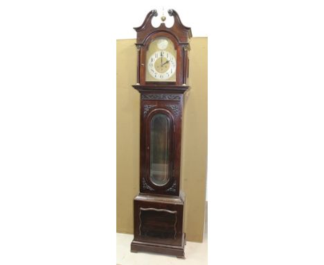 AN EDWARDIAN MAHOGANY LONGCASE CLOCK, having hood with swan neck pediment and brass capped Corinthian columns, flanking an ar