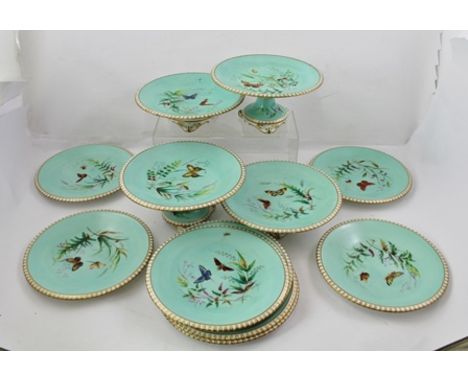 A LATE 19TH PART PORCELAIN DESSERT SERVICE, having jade green ground, hand painted with insects, fern fronds etc., gilded rim