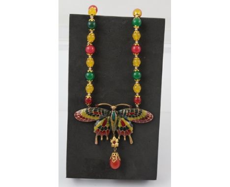 A CHAMPLEVE ENAMEL BUTTERFLY NECKLACE with dyed red, yellow and green jade beads 
