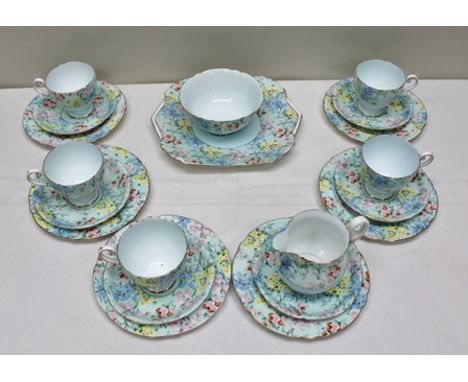 A SHELLEY "MELODY" PATTERN PART TEA SERVICE in floral chintz design, comprising serving dish, 6 x tea plates, 6 x saucers, 5 