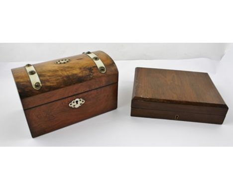 A VICTORIAN WALNUT CASKET (converted from a tea caddy, still retaining the inner lids, velvet lined) having brass stud decora
