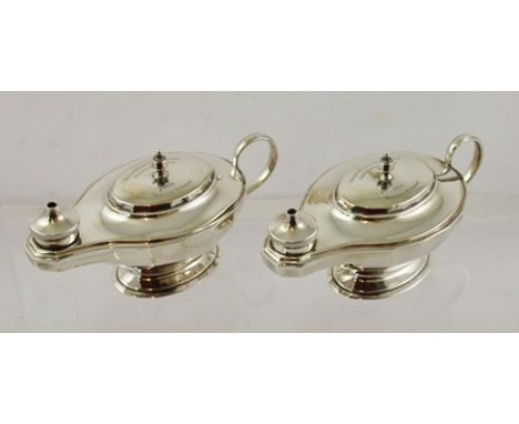 MAPPIN & WEBB LTD A PAIR OF SILVER ALADDIN'S LAMP SHAPED TABLE OIL LAMPS, each with facetted belly, inscribed Walton Heath Go