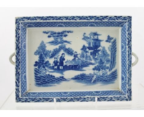 A PEARLWARE RECTANGULAR SERVING DISH circa 1800, possibly Spode, decorated in underglaze blue transfer, "Boy on Buffalo" patt