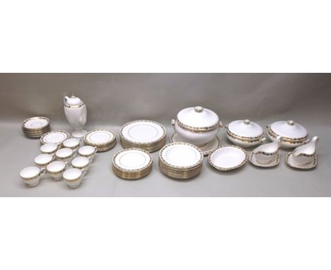 A COMPREHENSIVE WEDGWOOD BONE CHINA DINNER SERVICE "Whitehall pattern" with gilt vine decoration on white, comprising; 10 x 1